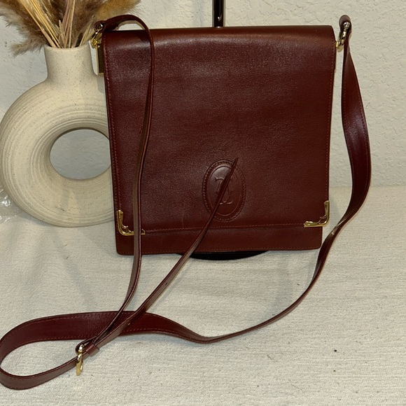 Cartier Handbags - Authentic Cartier Must De Cartier Leather shoulder/cross body bag Bordea…
